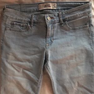 Super skinny Hollister light blue jeans.